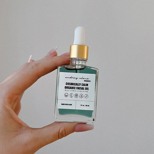 Blue Tansy and Squalane Organic Facial Oil bottle against a white background.