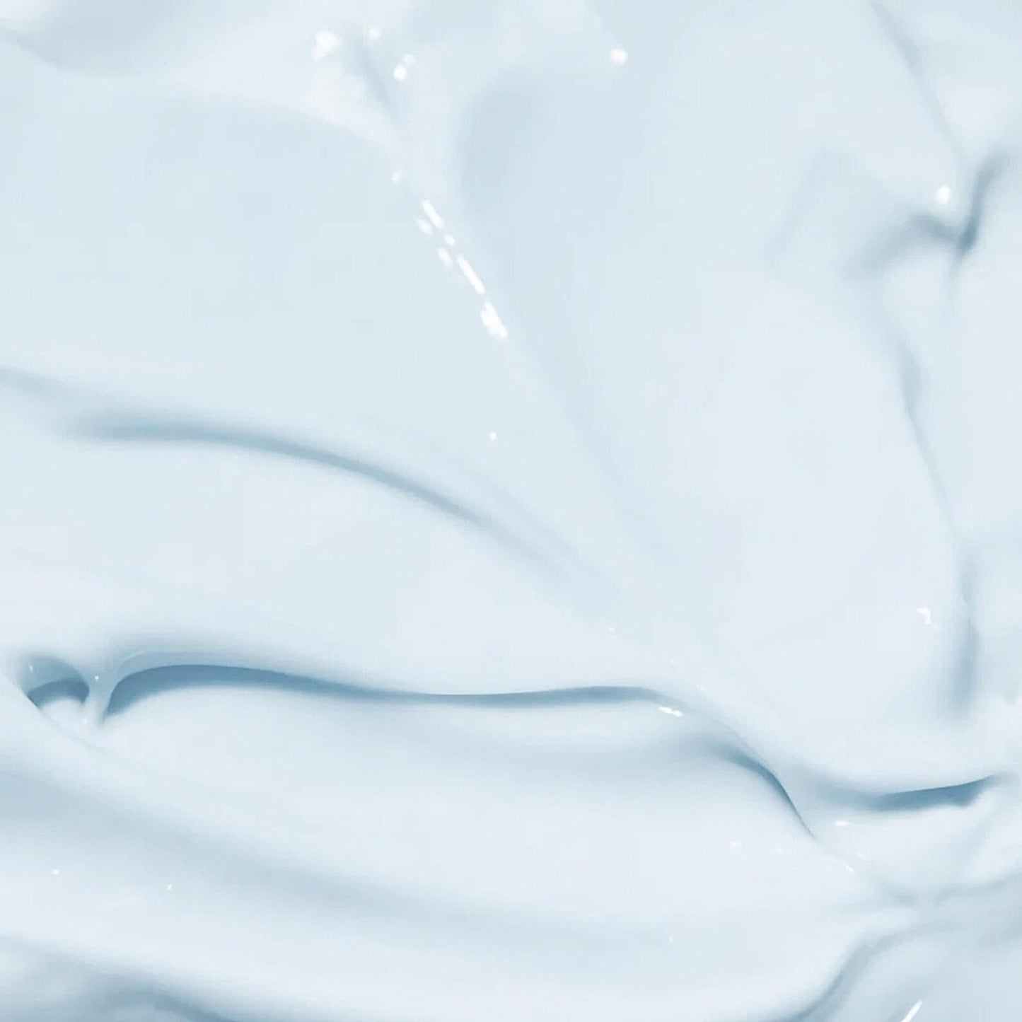 Smooth, light blue cleanser texture