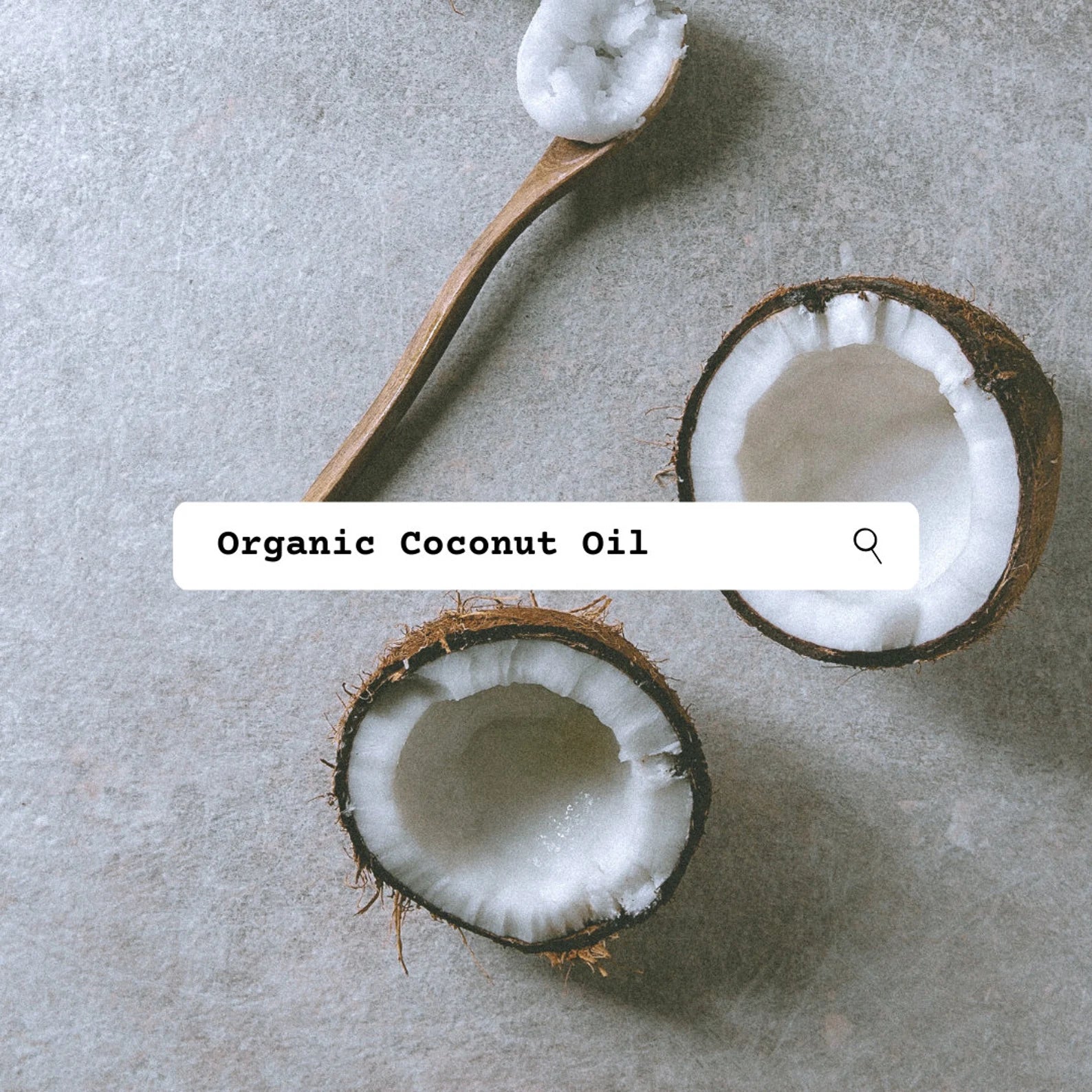 Coconut halves and a spoonful of coconut oil on a gray surface with 'Organic Coconut Oil' text overlay.