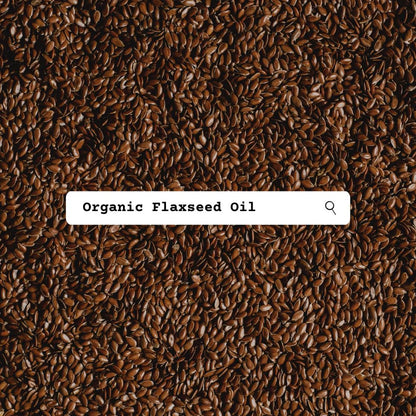 Close-up of organic flaxseeds with a search bar overlay.